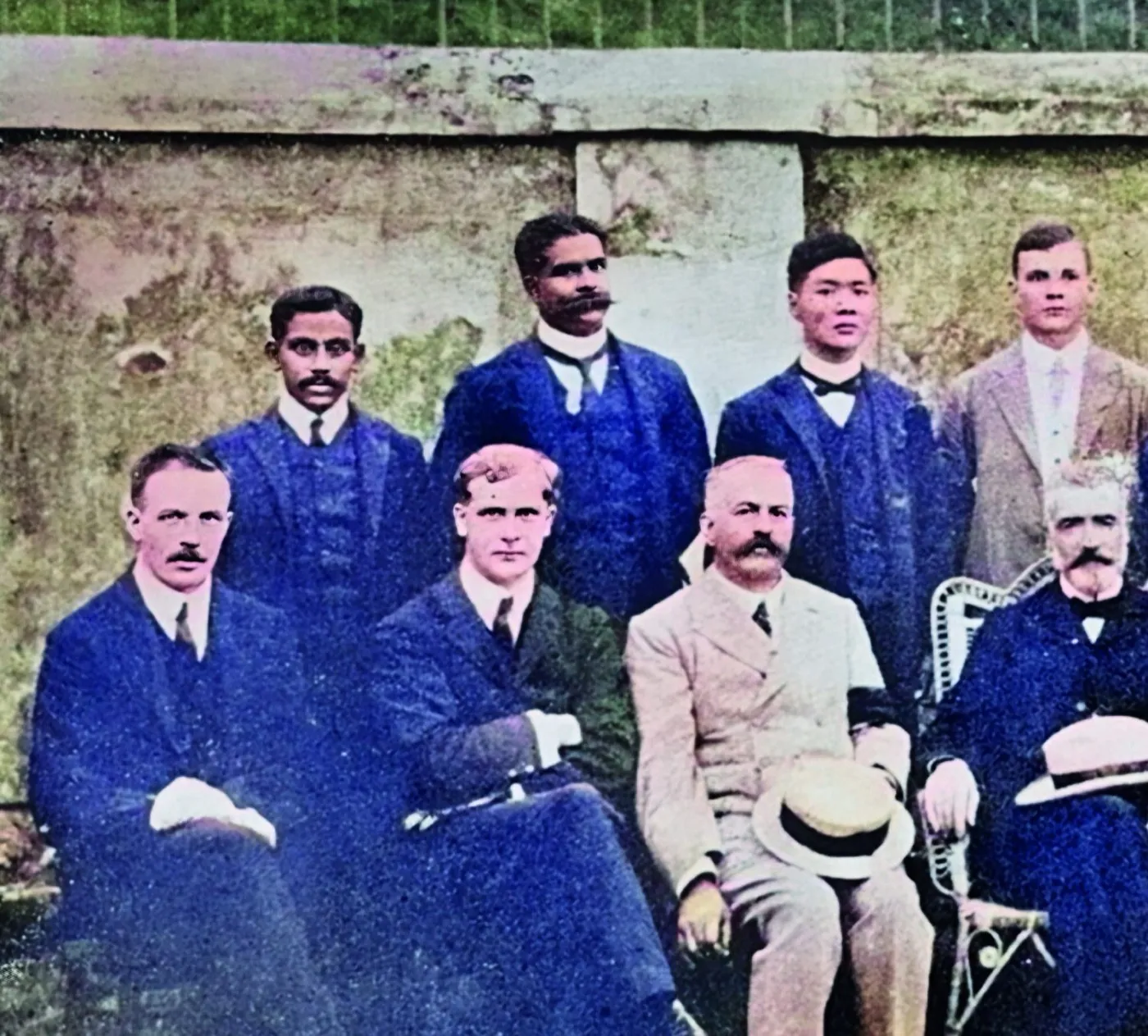 Colourised group portrait of the first graduates of the Straits and Federated Malay States Government Medical School with their teachers, 1910